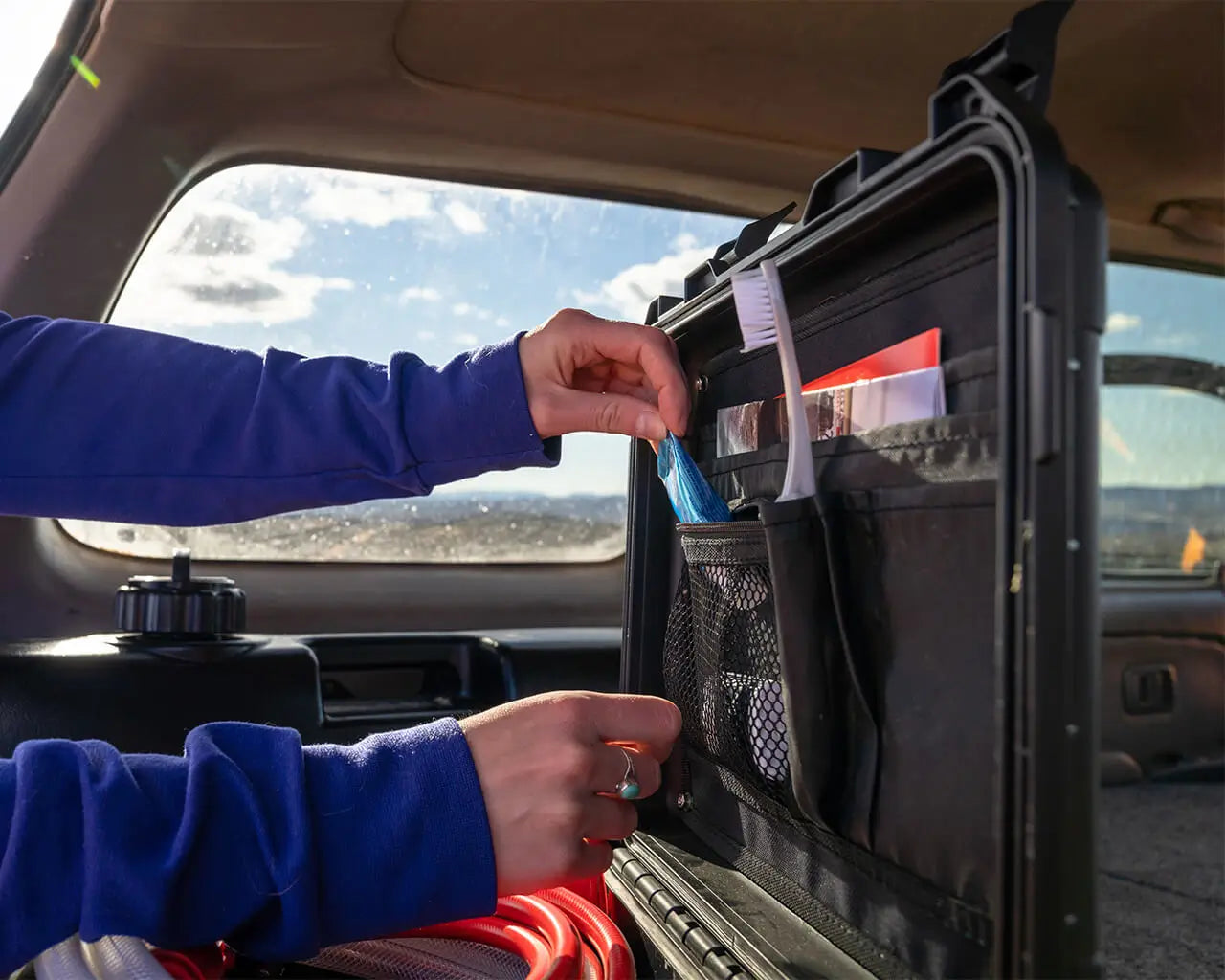 Open HydroSpray case showing organizational ability within lid